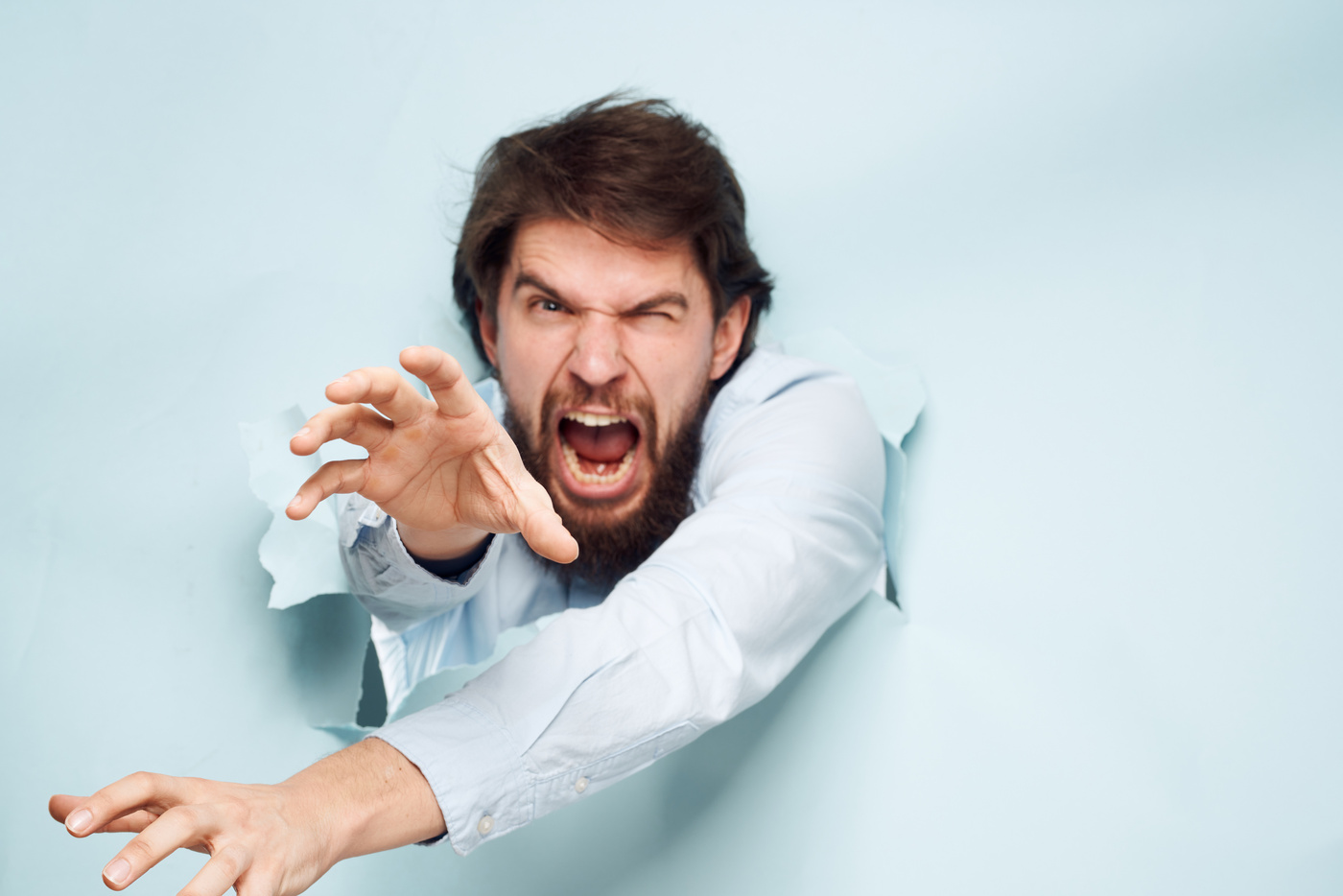 Emotional Man Breaks through the Wall of Emotions Career Work Finance